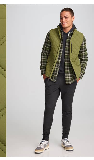 heritage quilted vest image on model in color 'marsh'