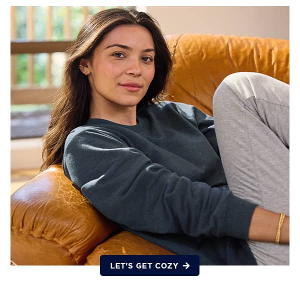 women's fall shop banner image on model / leg's get cozy