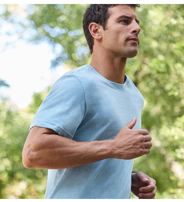 legacy crew neck tee image on model in color blue heather