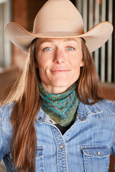 A woman wearing a cowboy hat.