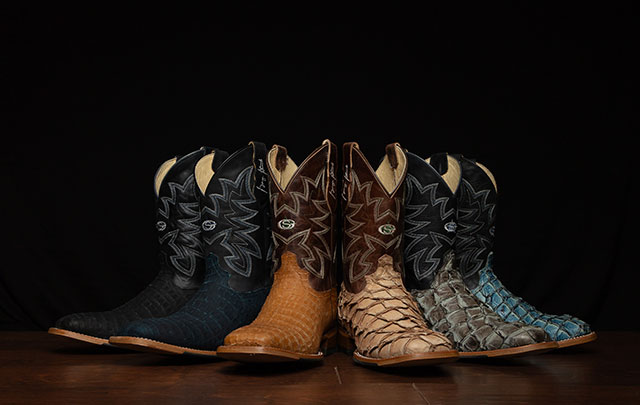 A group of men's George Strait Western Boots.