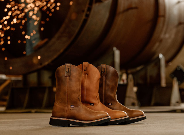 A collection of ustin Homeland work boots.