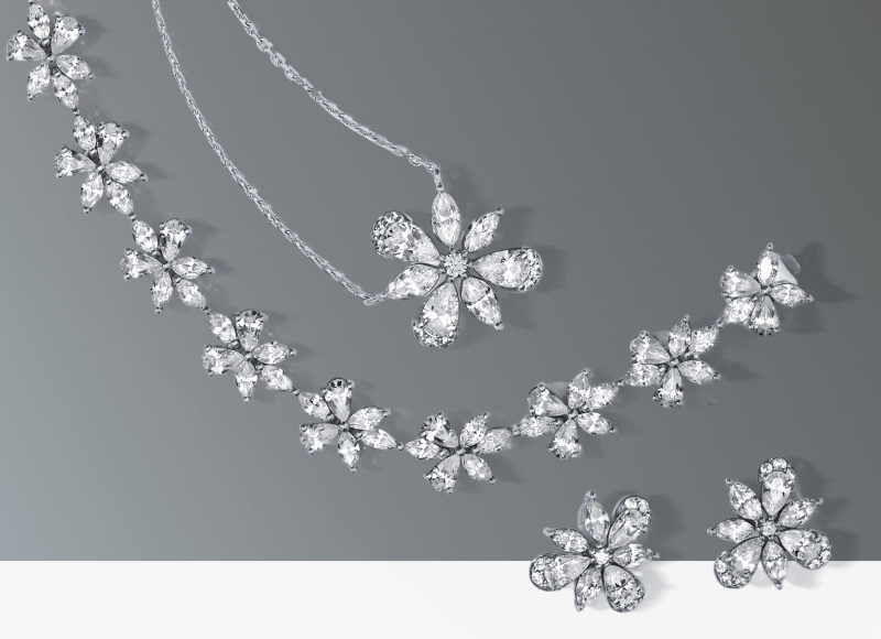 Examples of stunning floral earrings, bracelet and necklace