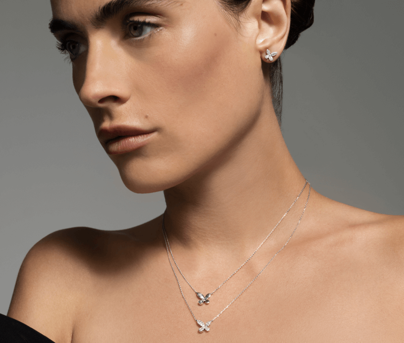Woman showcasing delicate cool-toned neclackes