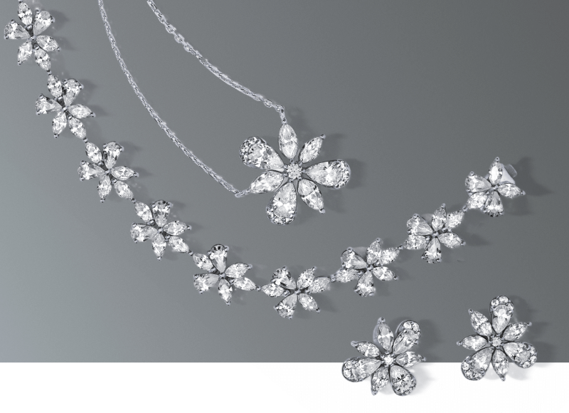 Pendant, bracelet and earrings from the Monique Lhuillier Bliss collection.