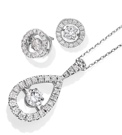 White gold diamond pendant necklace shown next to matching white gold diamond stud earrings.
