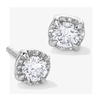 Round diamond stud earrings in white gold.