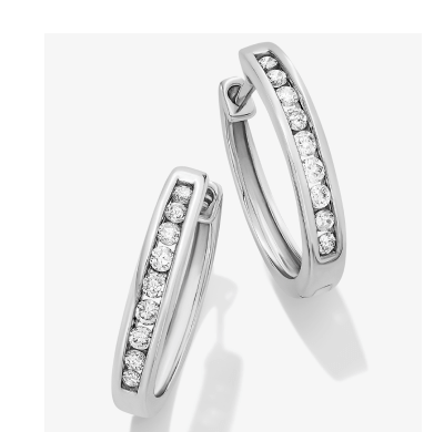 White gold diamond hoop earrings with channel-set round diamonds.