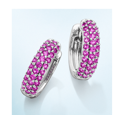 Pair of white gold diamond hoop earrings with pavé-set round diamonds in the front.