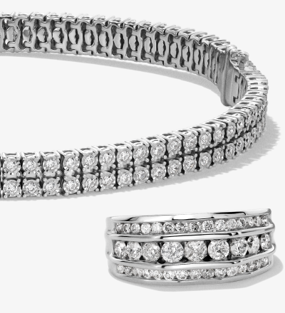 Diamond Tennis Bracelet and Multi Row Diamond Ring in White Metal.
