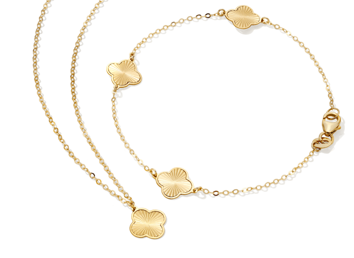 Italian Brilliance Clover Pendant Necklace and Station Bracelet in 14K Yellow Gold.