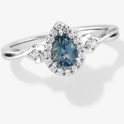 White Gold Blue Sapphire and Diamond Halo Ring.