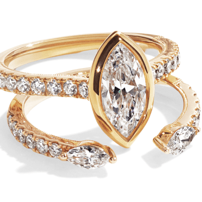 Yellow Gold Bezel-Set Marquise-Cut Diamond Engagement Ring with Matching Pavé Band.