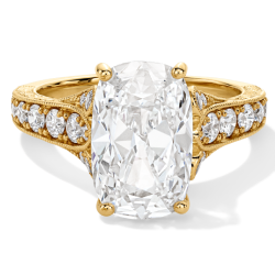 Elongated Cushion-Cut Diamond Ring with Yellow Gold Prongs and Textured Yellow Gold Band.