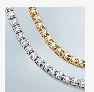 Yellow gold and white gold diamond tennis necklaces.