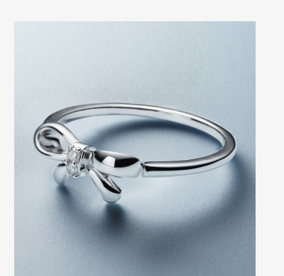 Silver bow ring.