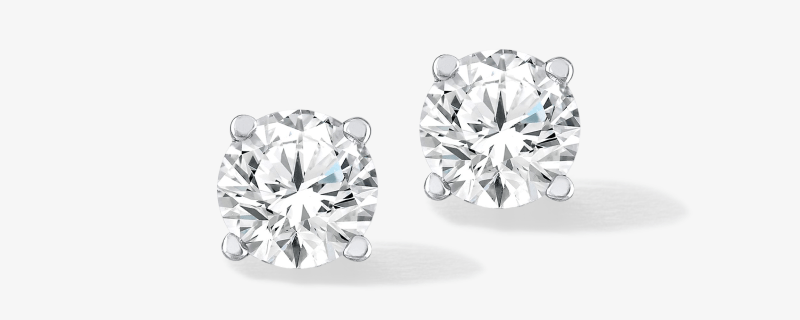 White Gold Solitaire Diamond Stud Earrings.