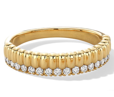 Yellow gold anniversary ring with row of pave diamonds.