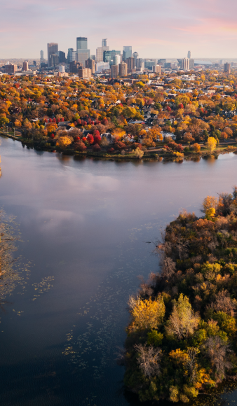 beautiful lake with fall colors and with city view