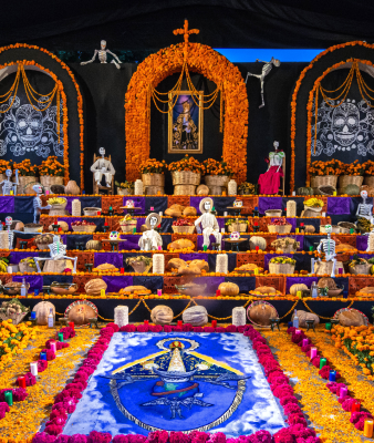 Day of the dead ofrenda- adorned with vibrant orange marigolds.