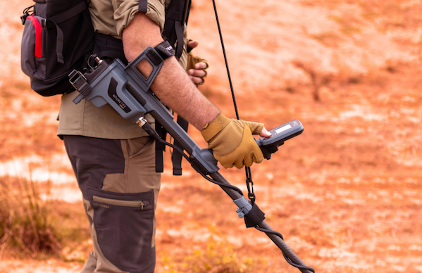 Detectorist in the desert equipped with the Magnetar 9000 