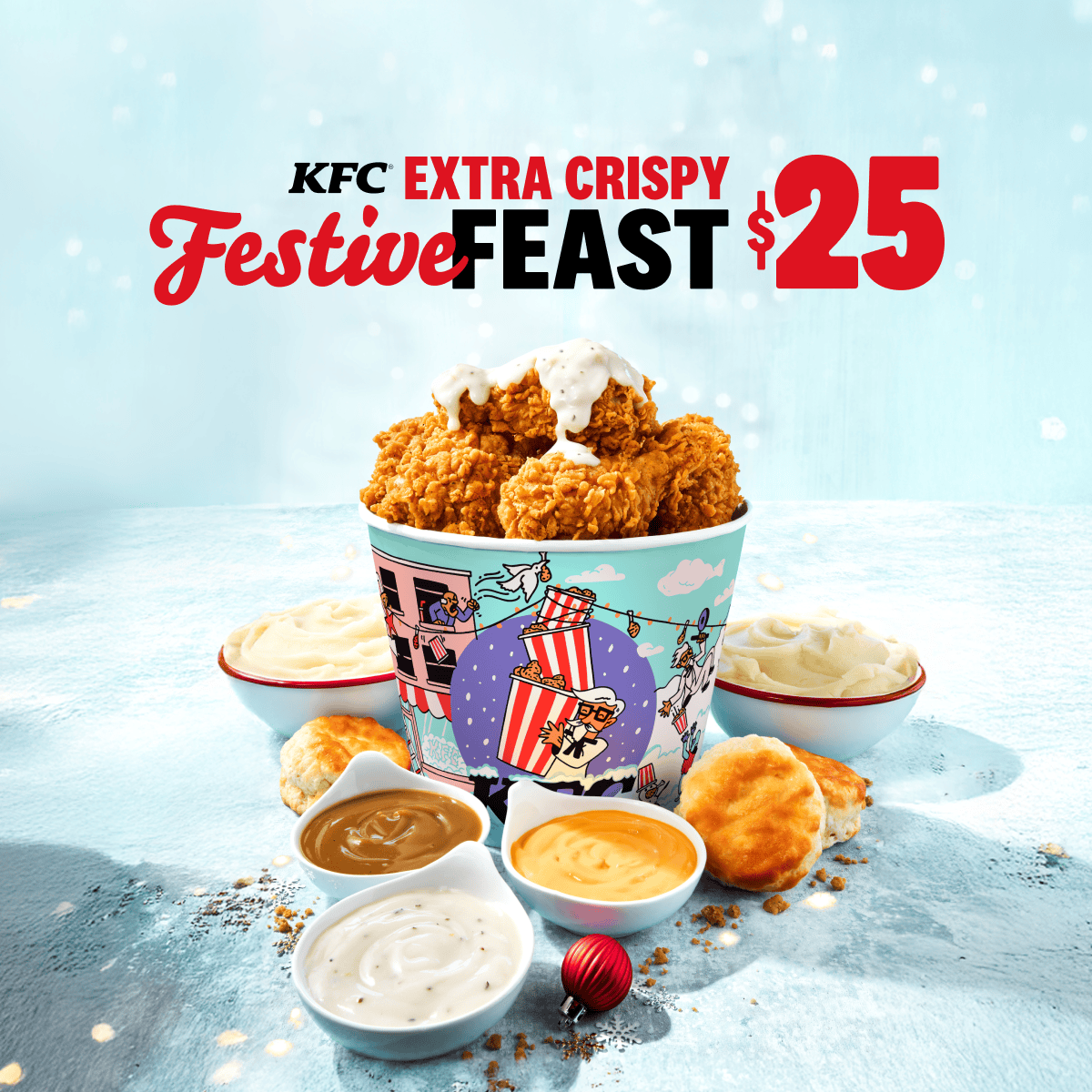 A wintery scene with delicious KFC offerings in front of the words KFC Extra Crispy Festive Feast $25.