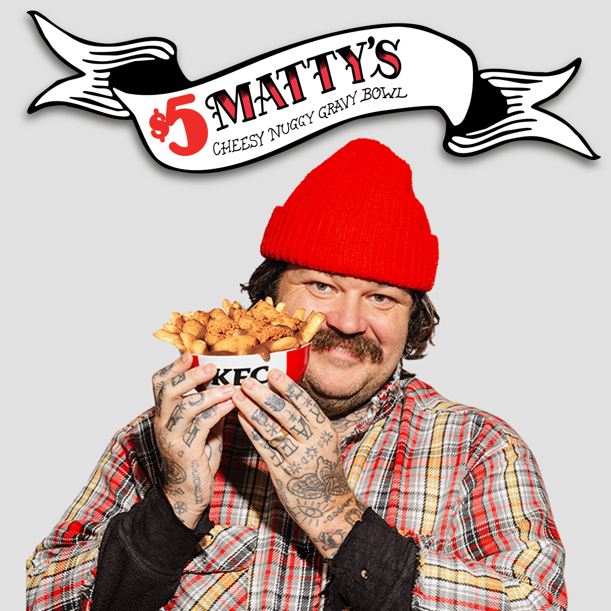 Matty Matheson holding his Cheesy Nuggy Gravy Bowl that you can get for just $5