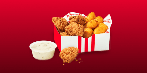 A KFC box with Chicken Nuggets and Cheese Curds.