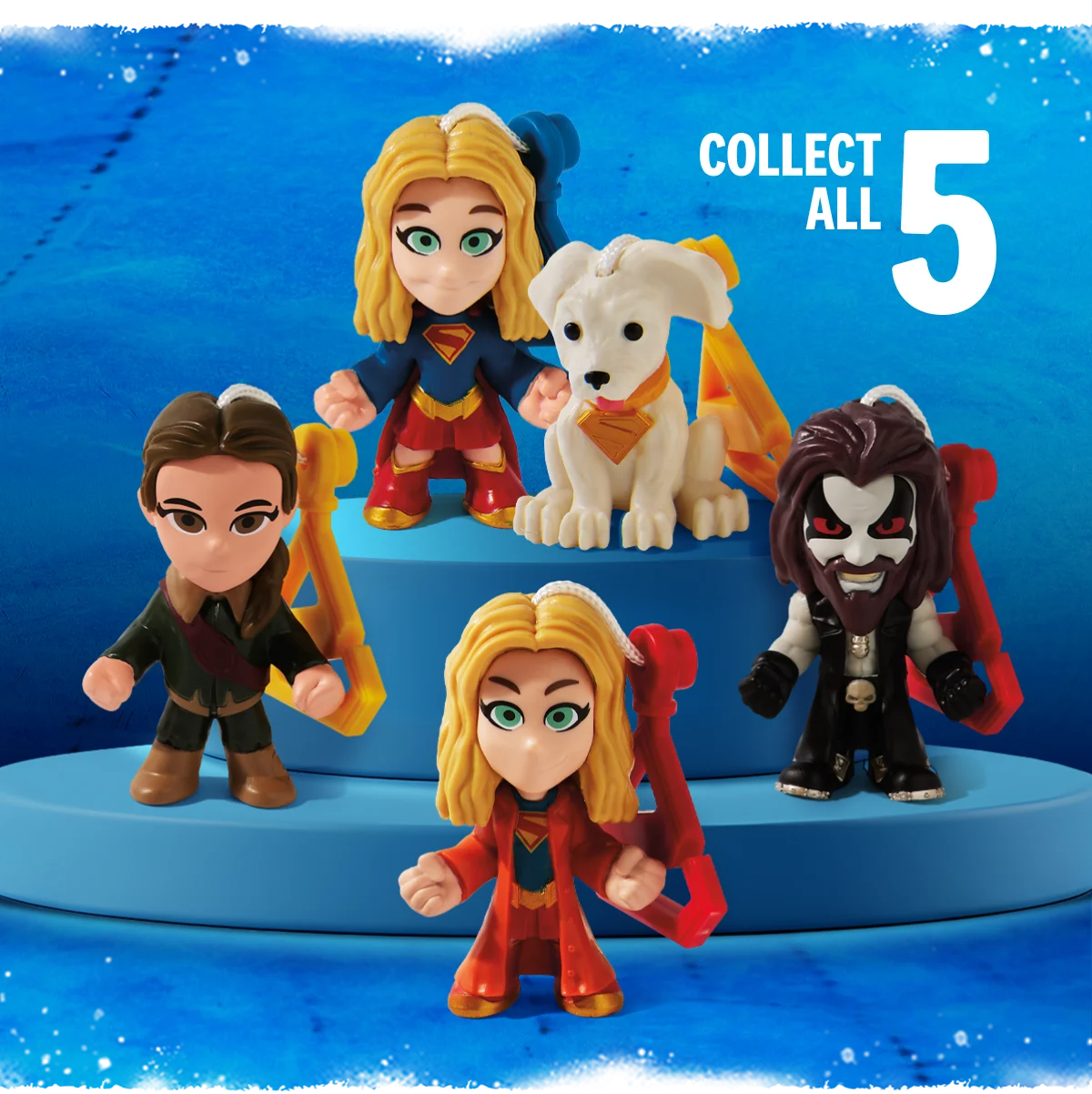 The five Supergirl collectable dolls arranged on pedistals.