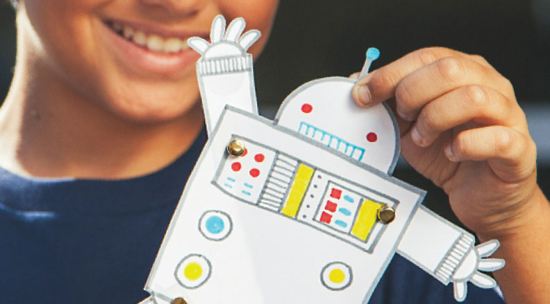 Dancing Robot Puppets: A child holds a paper robot puppet. Text: Learn about levers and create a moving, dancing puppet.