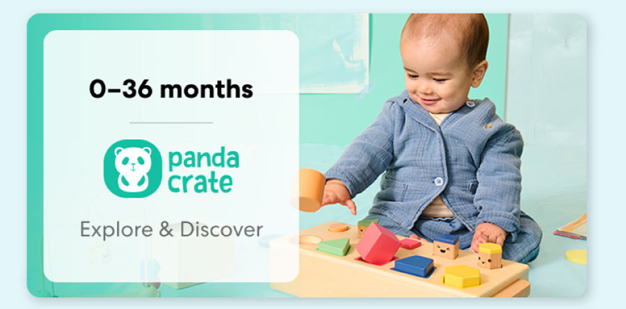 Baby playing with a KiwiCo Panda Crate toy. Designed for ages 0–36 months to explore and discover.
