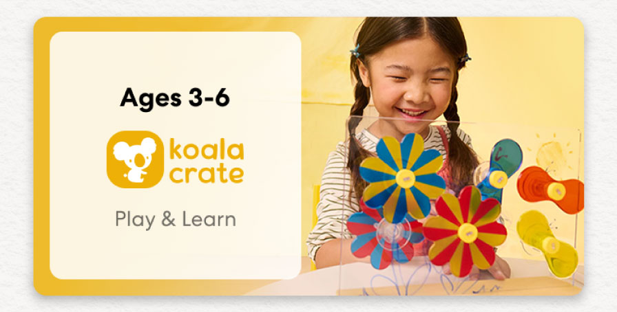 Young child smiling while working on creative KiwiCo Sprout projects, perfect for ages 3–5 for play and learn.