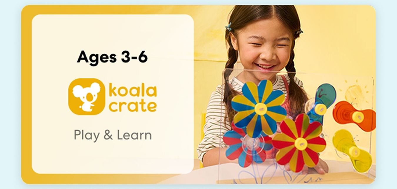 Young child smiling while working on creative KiwiCo Sprout projects, perfect for ages 3–6 for play and learn.