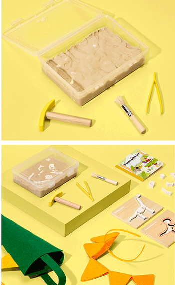 Dinosaur Dig from Koala Crate. Dig bones out of a bin of sensory sand, then put them together to make two dino skeletons.