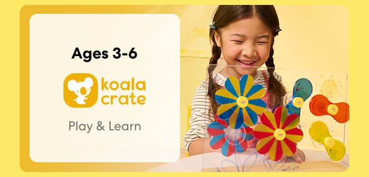 Young child smiling while working on creative Koala Crate projects. Hands-on play and learn, perfect for ages 3 to 6