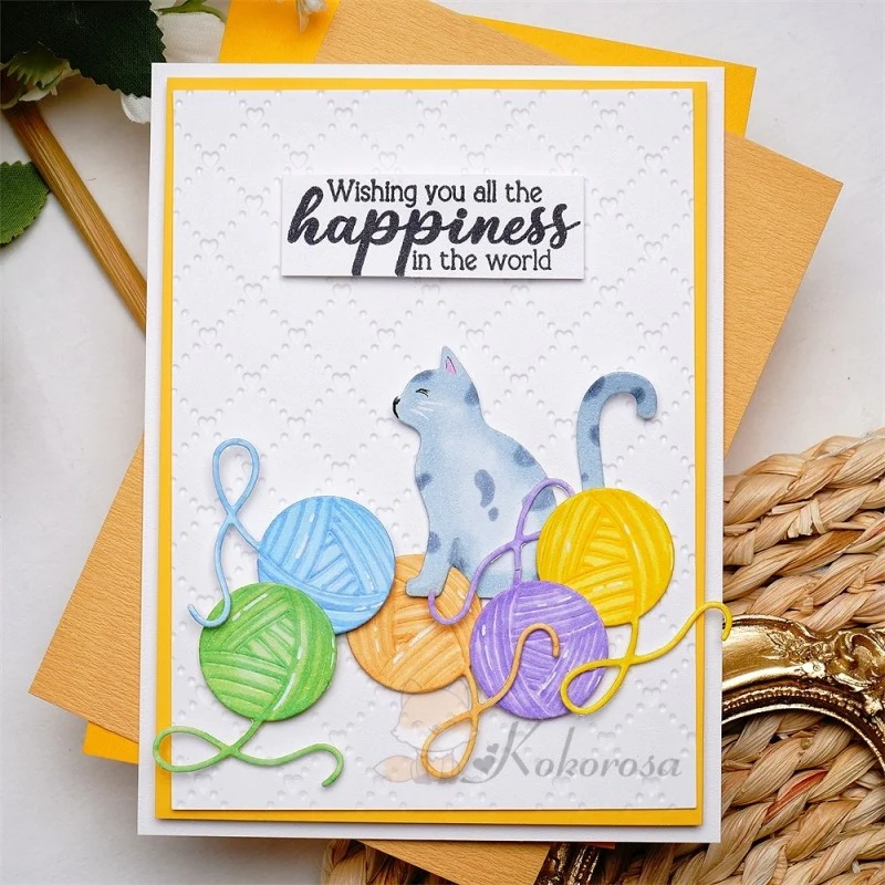 Cat & Pompoms