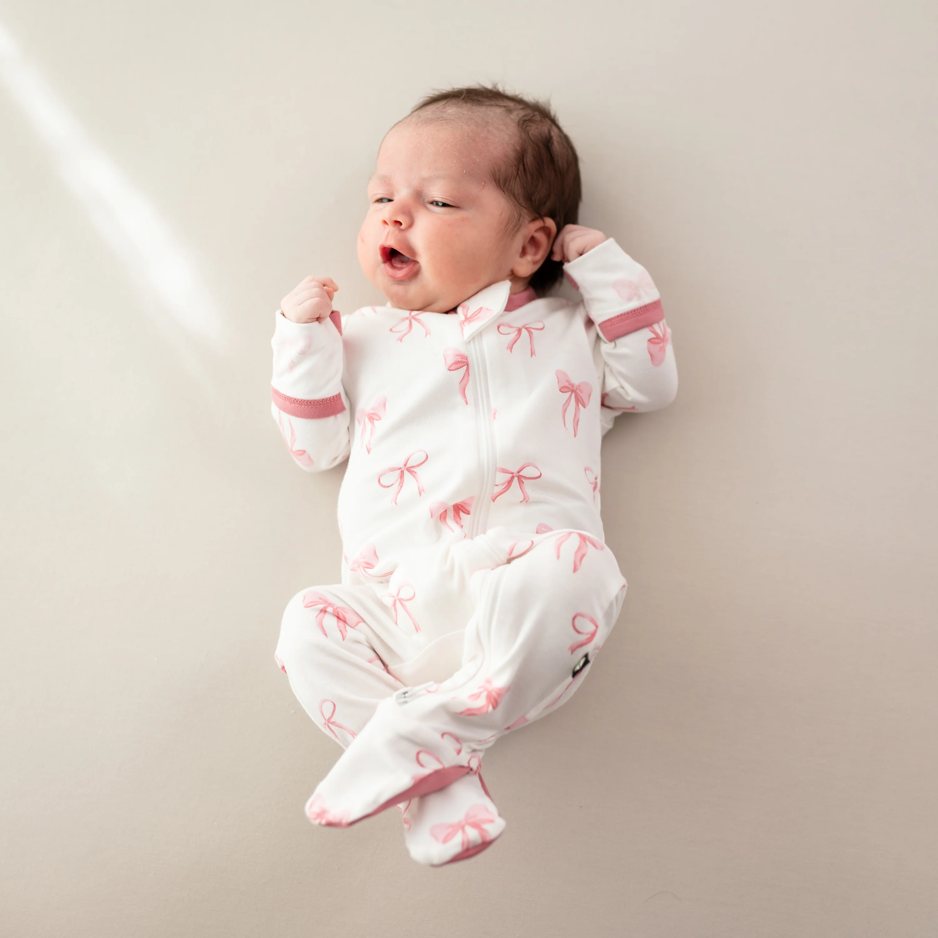 Image of Zippered Footie in Bow