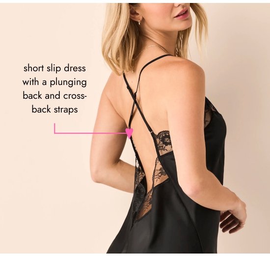 short slip dress with a plunging back and cross-back straps.