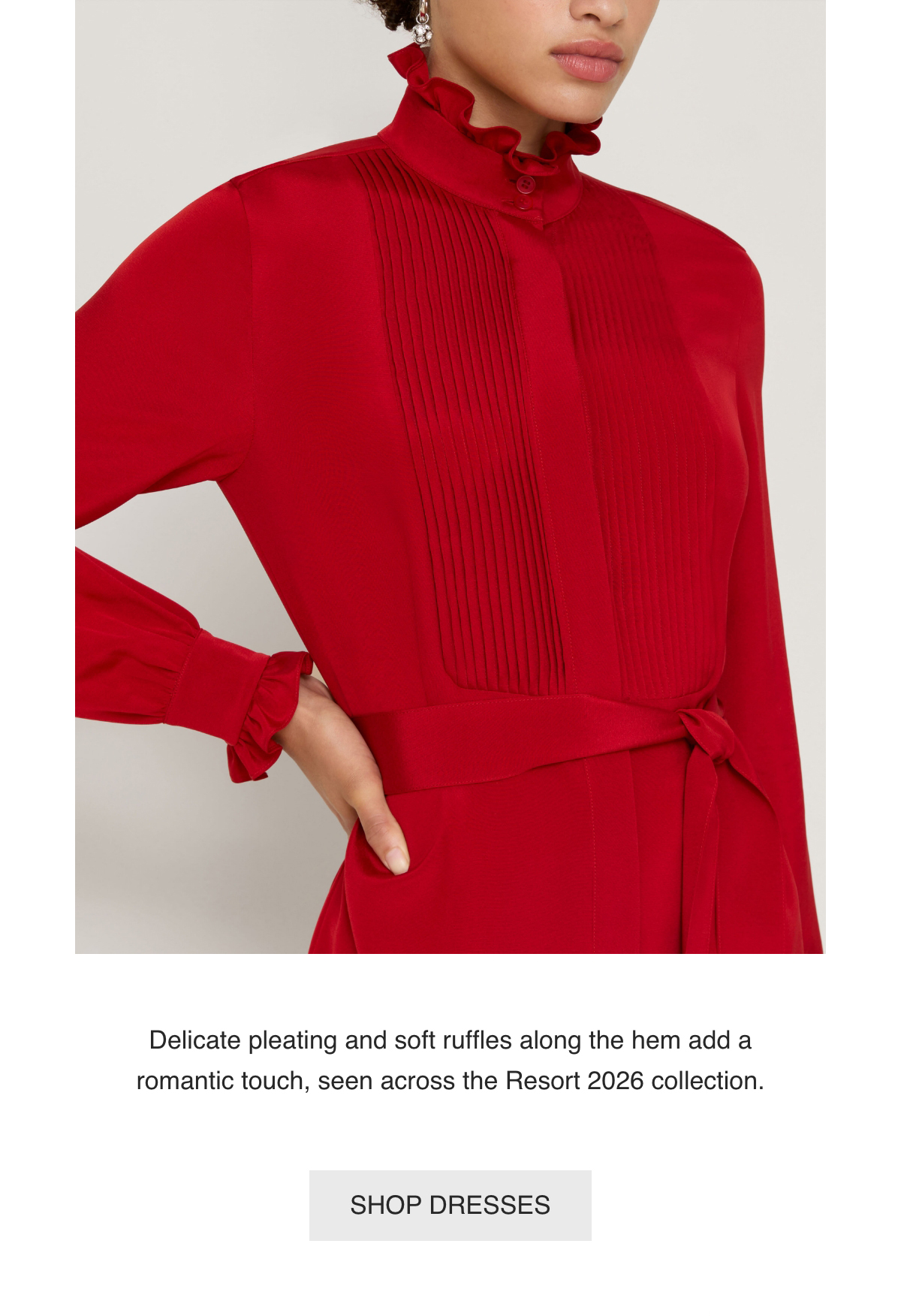 Delicate pleating and soft ruffles along the hem add a romantic touch, seen across the Resort 2026 collection.-[SHOP DRESSES]