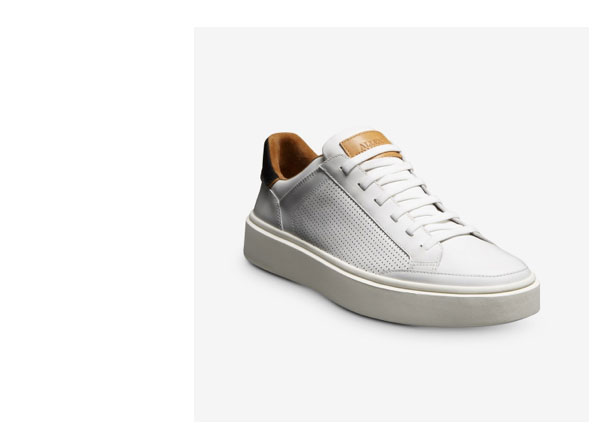 Click here to shop the bestselling Oliver Stretch-Lace Sneaker in white leather.