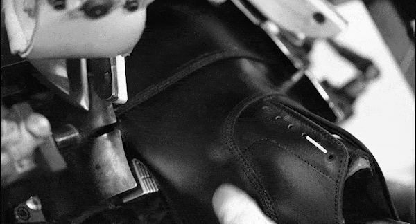 Gif Of An Artisan In The Factory At Port Washington, Wisconsin Crafting A New Shoe. Click Here To Learn More About The Port Washington Studio.