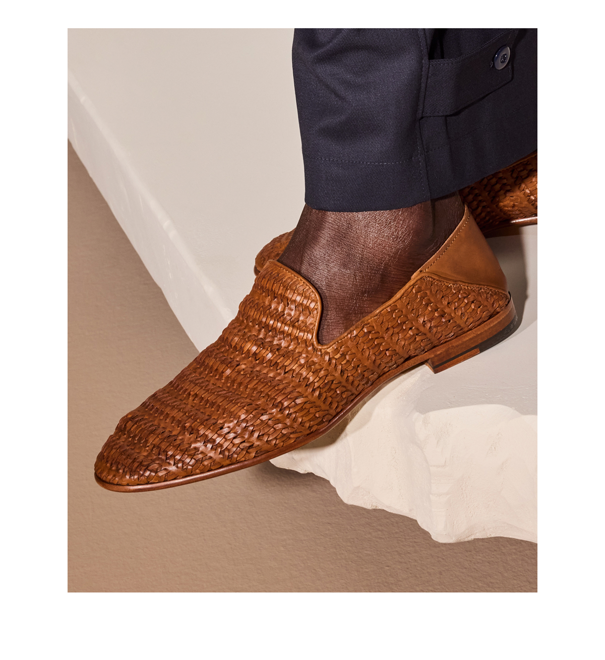 A Close-up Image Of The Weaving Featured In The Portofino Slip-on Loafer In Chili Woven Leather.