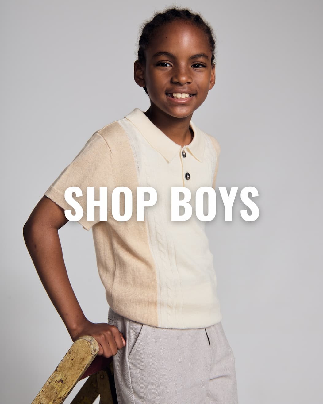 Boy in Green Linen Set with white text shop boys