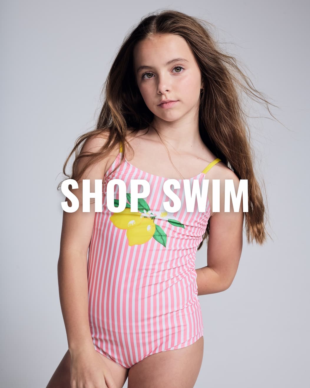 Appaman Girl in Swimsuit with Lemons with White Text Shop Swim