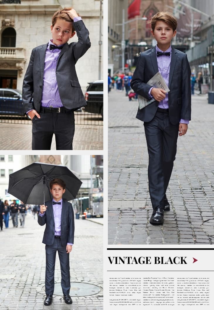 Boy outside in NYC wearing dark grey suit with purple shirt 