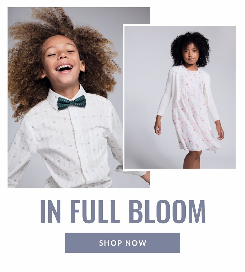 Boy and girl on grey background wearing white dress shirt and white dress