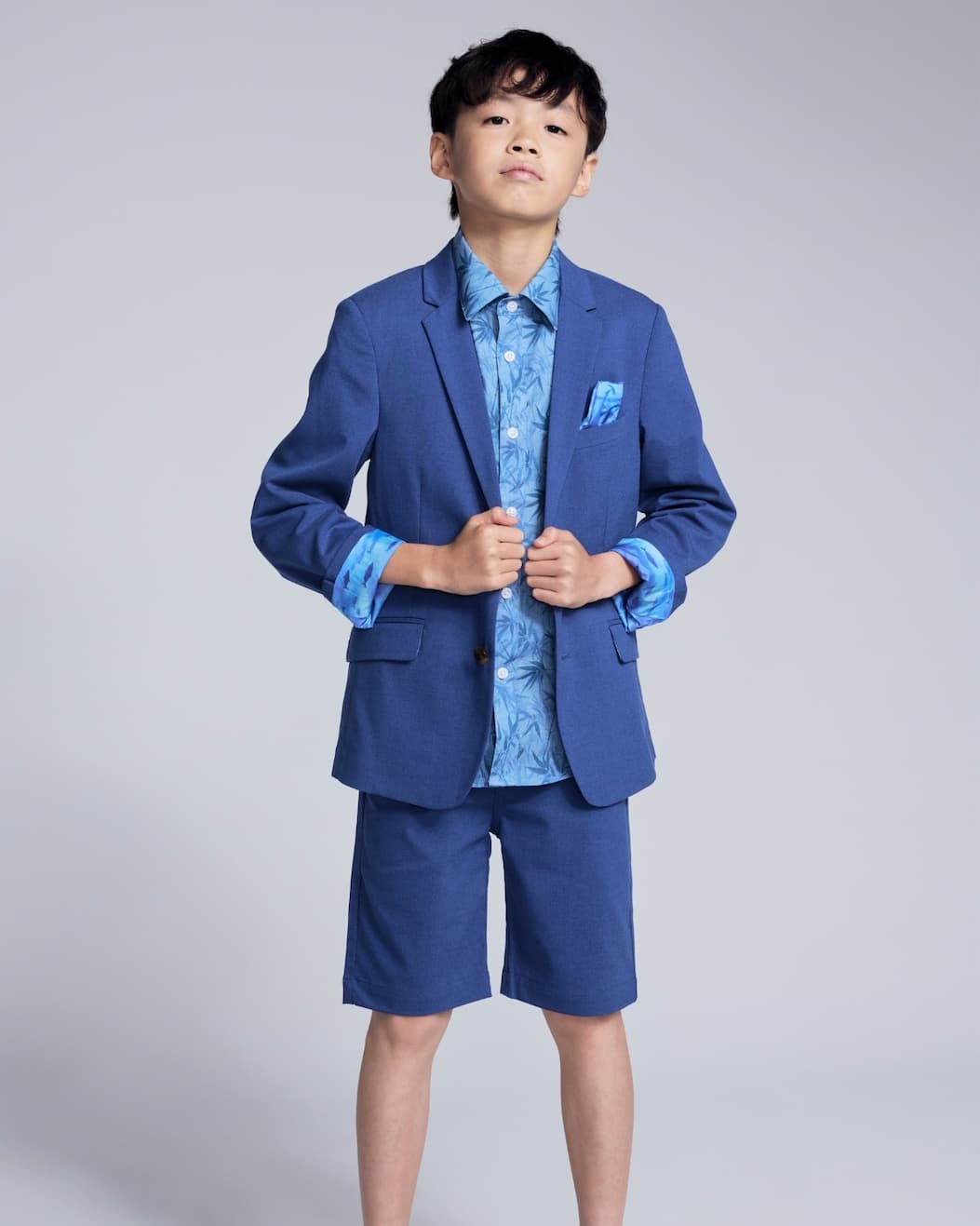 Boy on grey background wearing Linen Blue Suit Set