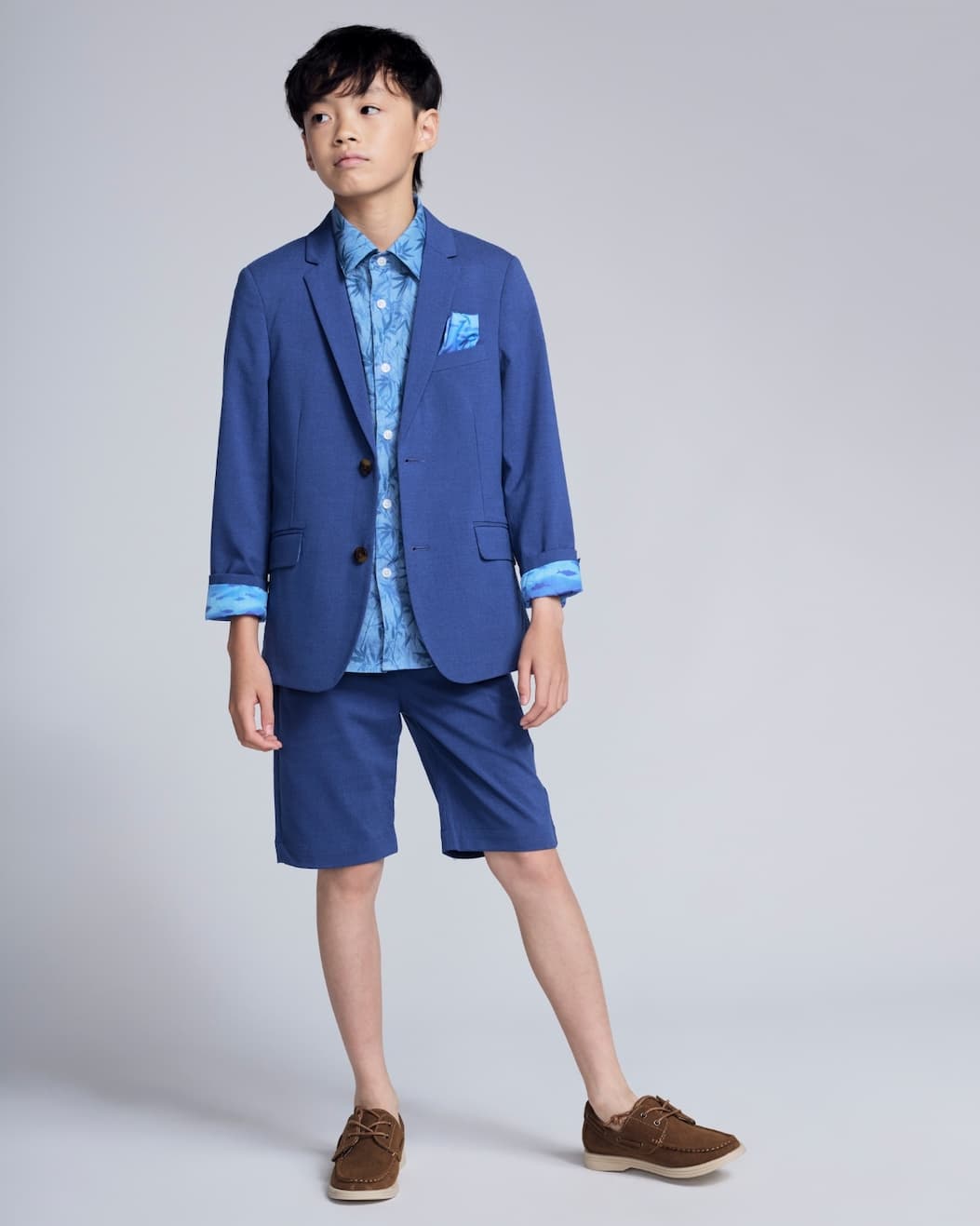Boy on grey background wearing Linen Blue Suit Set
