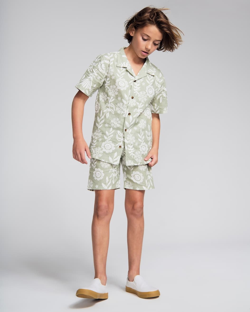 Boy on grey background wearing Linen Sage Sunflower Set