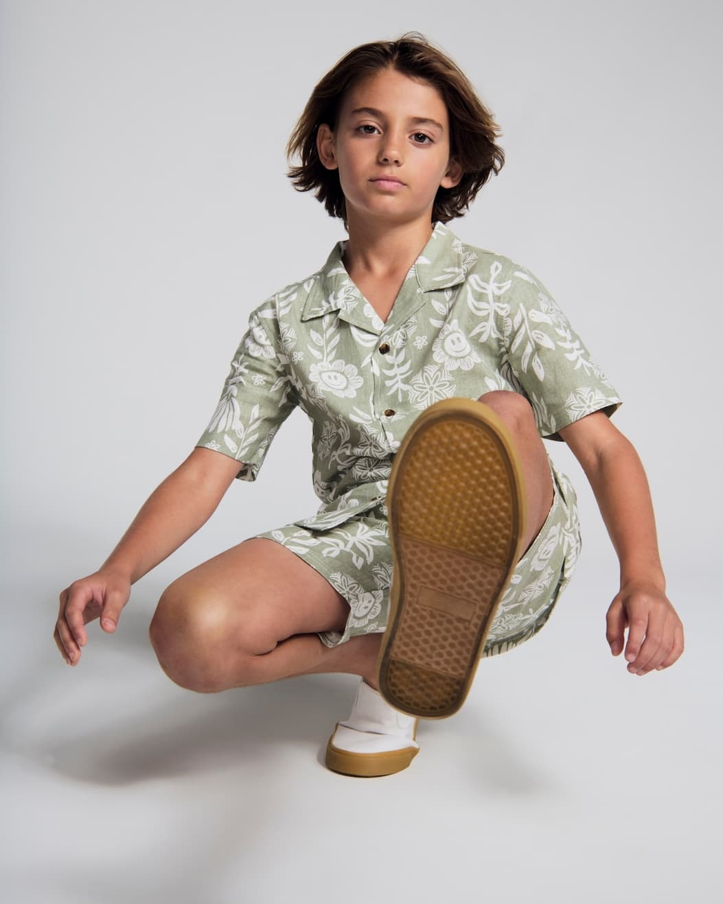 Boy on grey background wearing Linen Sage Sunflower Set